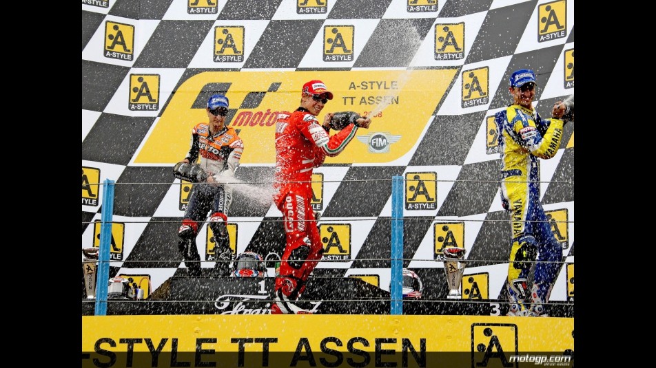 Pedrosa, Stoner and Edwards celebrate on the podium at Assen
