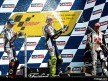 Lorenzo, Rossi and Elias celebrating victory on the podium at Misano