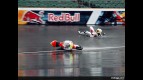 Romanian rider Robert Muresan crashes in the first practice session at Indianapolis