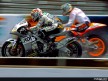 Yuki Takahashi riding side-by-side with Julián Simón in practice at Indianapolis