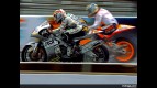 Yuki Takahashi riding side-by-side with Julián Simón in practice at Indianapolis