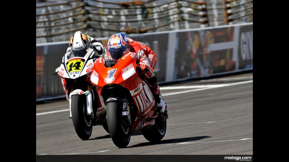 Casey Stoner riding ahead of Randy de Puniet during Qualifying Practice at Indianapolis