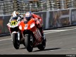 Casey Stoner riding ahead of Randy de Puniet during Qualifying Practice at Indianapolis