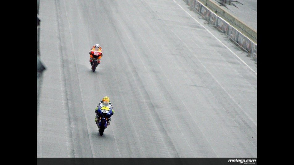 Valentino Rossi riding ahead Nicky Hayden at Indianapolis