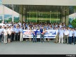 James Toseland and Jorge Lorenzo with the Yamaha staff in Iwata