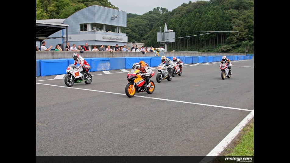 Honda MotoGP riders racing minibikes in Motegi