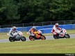 Honda MotoGP riders racing minibikes in Motegi