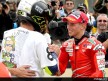 Stoner salutes new World Champion Valentino Rossi in the parc fermé