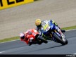 Valentino Rossi riding ahead of Casey Stoner in Motegi