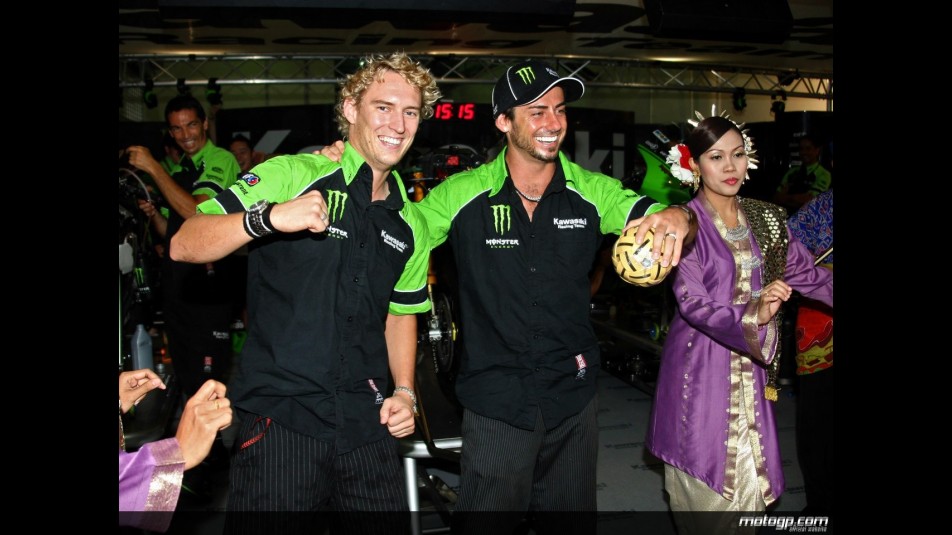 Anthony West and John Hopkins partake in traditional Malaysian activities