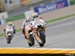 Jorge Lorenzo riding ahead of Shinya Nakano and Alex de Angelis in Valencia