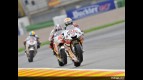 Jorge Lorenzo riding ahead of Shinya Nakano and Alex de Angelis in Valencia