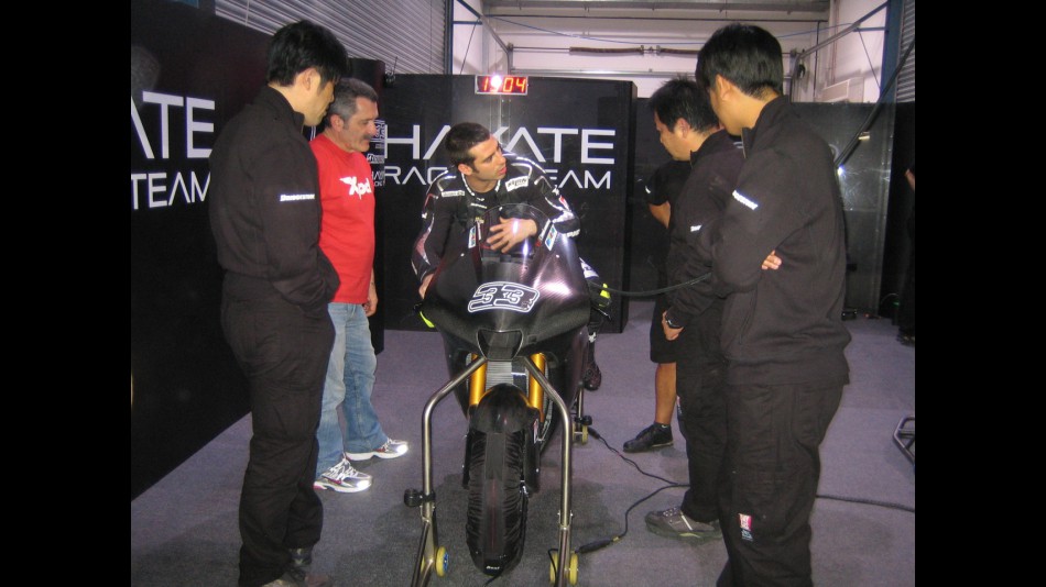Marco Melandri in the Hayate Racing Team box