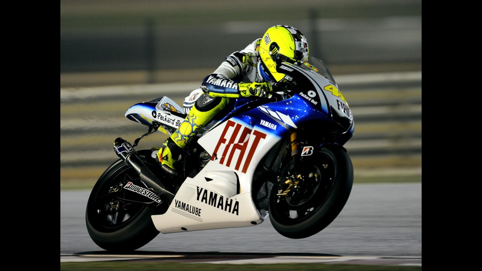 Valentino Rossi working on the new 2009 YZR-M1 Yamaha at the Qatar Night Test