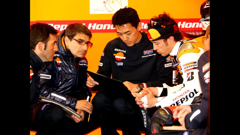 Andrea Dovizioso with Repsol Honda Staff in the garage
