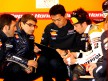 Andrea Dovizioso with Repsol Honda Staff in the garage