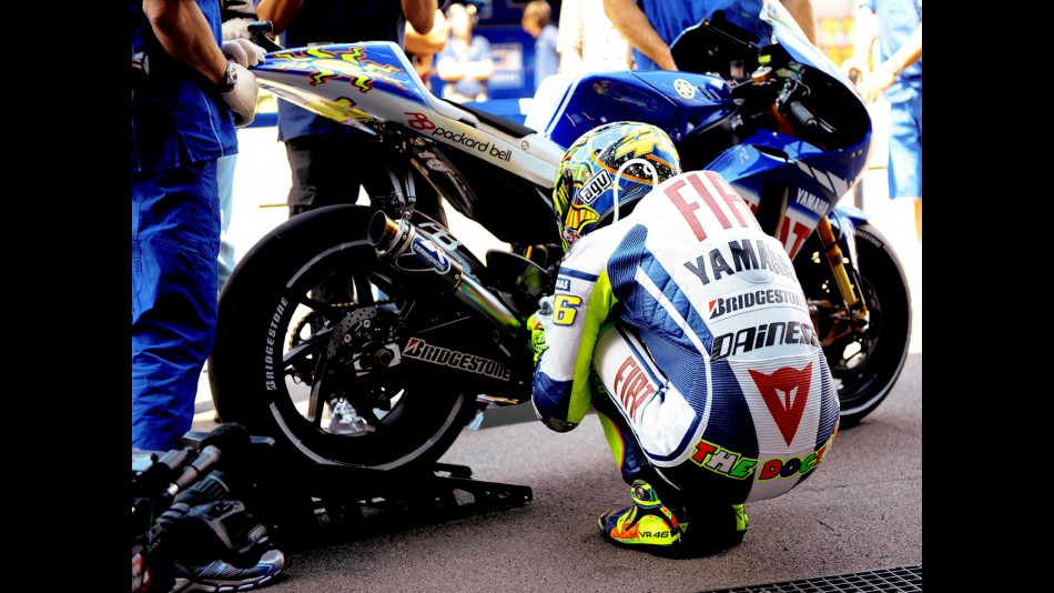 Valentino Rossi preparing to leave the Fiat Yamaha garage