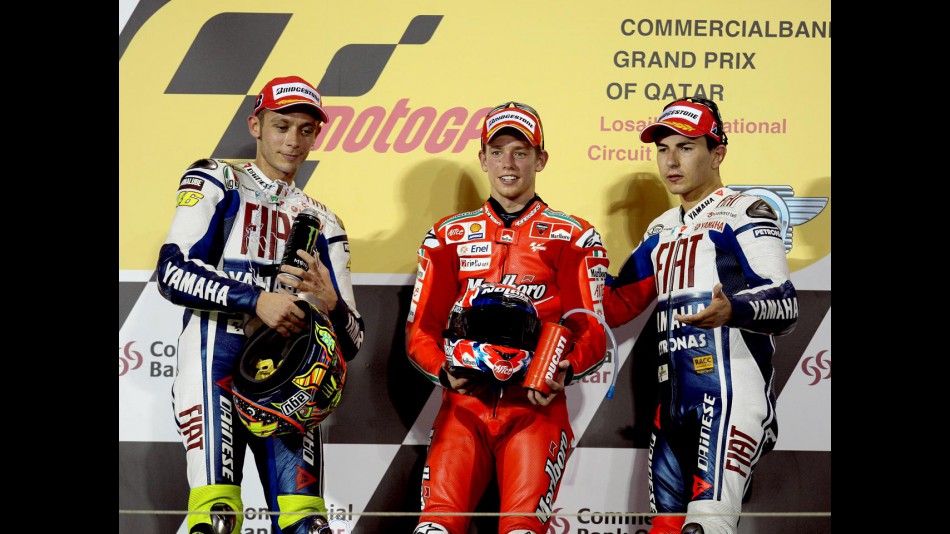 Valentino Rossi, Casey Stoner and Jorge Lorenzo on the podium at Qatar