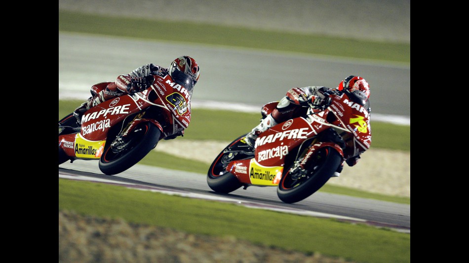 Alvaro Bautista and Mike di Meglio in action in Qatar