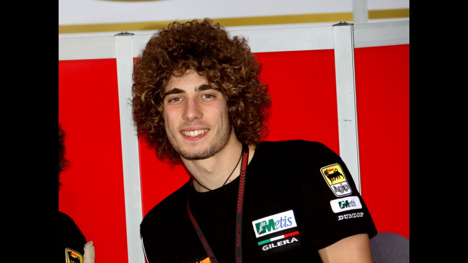 Marco Simoncelli in the Metis Gilera garage
