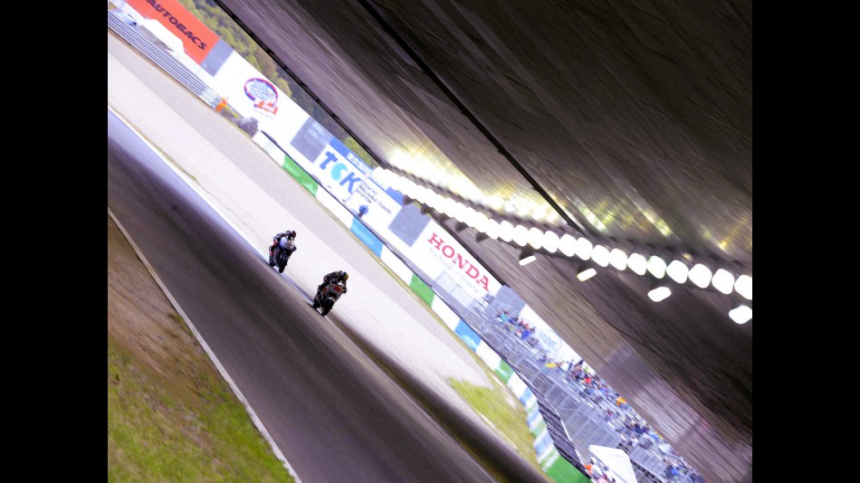 Alex de Angelis and Jorge Lorenzo on track in Motegi