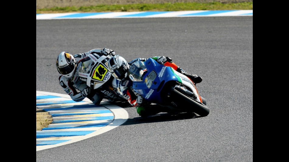 Sete Gibernau and Randy de Puniet in action in Motegi