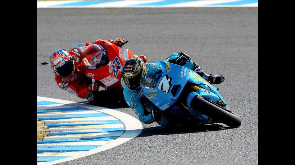 Chris Vermeulen and Casey Stoner in action in Motegi