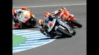 Hiroshi Aoyama riding ahead of Alvaro Bautista and Marco Simoncelli during 250cc race in jerez