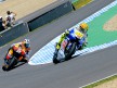 Valentino Rossi riding ahead of Dani Pedrosa during MotoGP race in Jerez