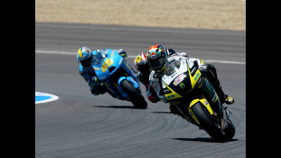 Colin Edwards riding ahead of Marco Melandri and Loris Capirossi in Jerez