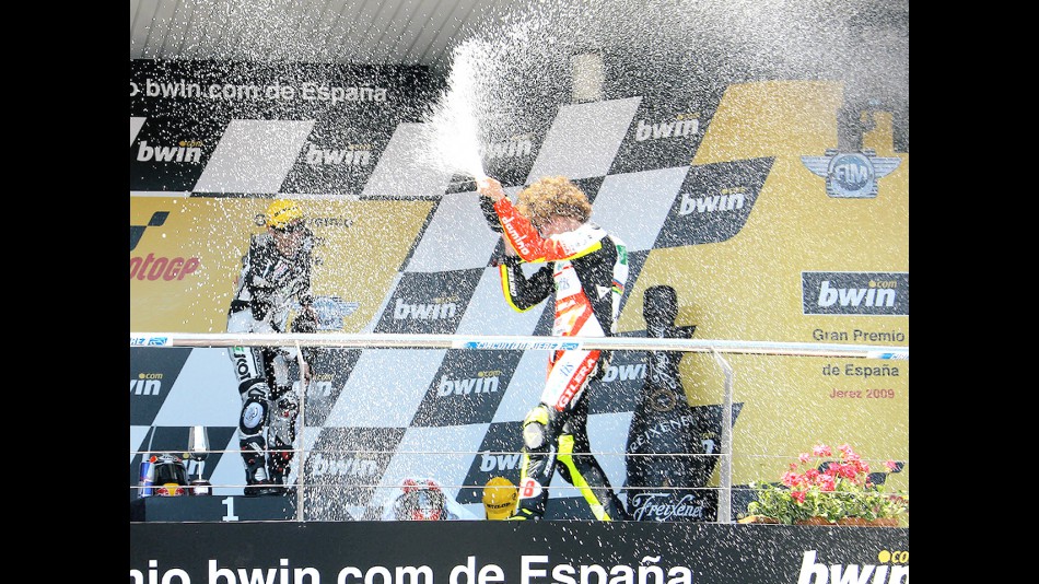 Hiroshi Aoyama and Marco Simoncelli on the podium at Jerez