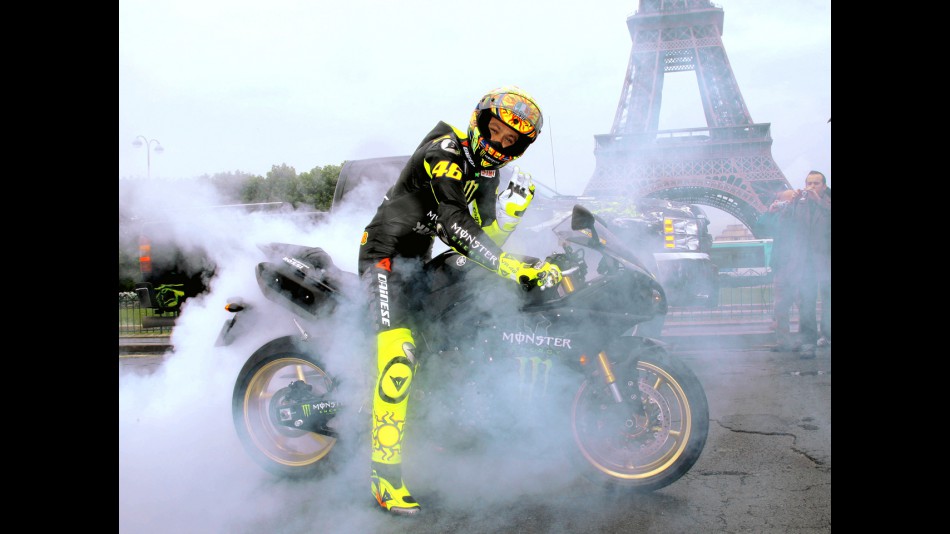 Valentino Rossi revs up through Paris streets