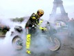 Valentino Rossi revs up through Paris streets