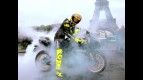 Valentino Rossi revs up through Paris streets