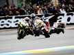 Randy de Puniet riding ahead of MotoGP group in Le Mans