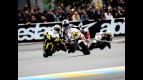 Randy de Puniet riding ahead of MotoGP group in Le Mans