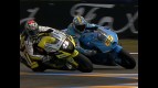 Colin Edwards and Loris Capirossi during race in Le Mans