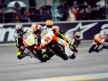 Marco Simoncelli riding ahead of 250cc group in Le Mans