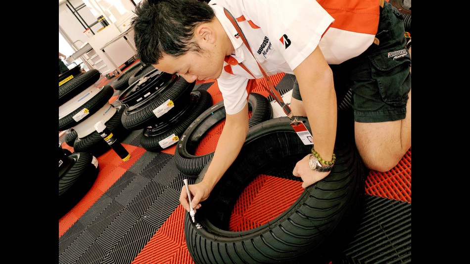 Bridgestone technician marking tyres