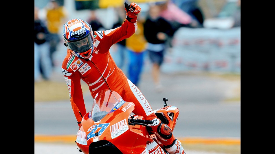 Casey Stoner celebrating victory at Mugello