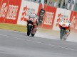 Mattia Pasini riding ahead of Marco Simoncelli at the finish of the 250cc Race in Mugello