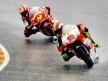 Marco Simoncelli riding ahead of Alvaro Bautista during 250cc race in Mugello