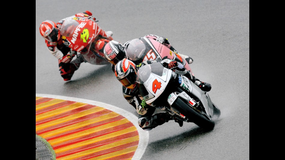 Hiroshi Aoyama riding ahead of Pasini and Bautista in Mugello