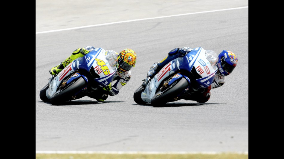 Valentino ROssi and Jorge Lorenzo riding head to head during the MotoGP Catalunya race