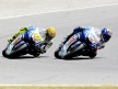 Valentino ROssi and Jorge Lorenzo riding head to head during the MotoGP Catalunya race