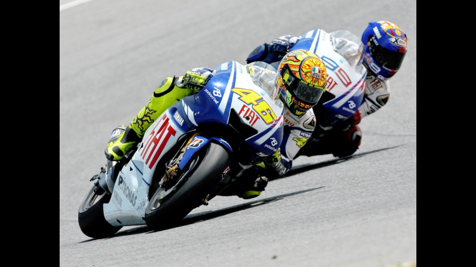 Valentino Rossi riding ahead of Jorge Lorenzo during the race at Catalunya Circuit