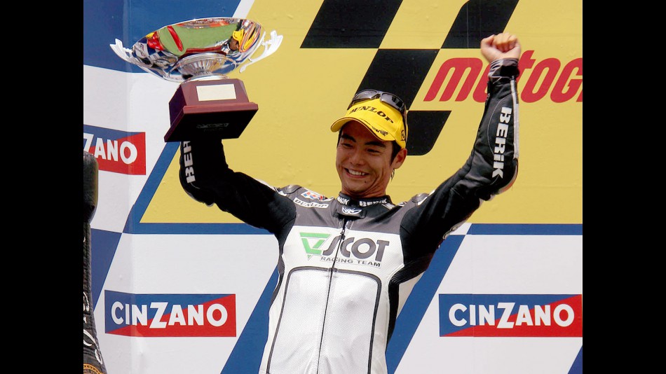 Hiroshi aoyama on the podium at Montmeló