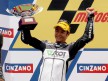 Hiroshi aoyama on the podium at Montmeló