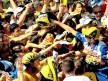 Yamaha rider Valentino Rossi attending fans at Catalunya Circuit