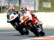 Héctor Barberá riding ahead of Aoyama Hiroshi in Montmeló